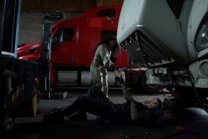 Auto technicians performing commercial fleet truck repairs to minimize vehicle downtime.